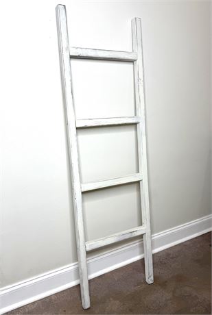 White Quilt and Blanket Ladder