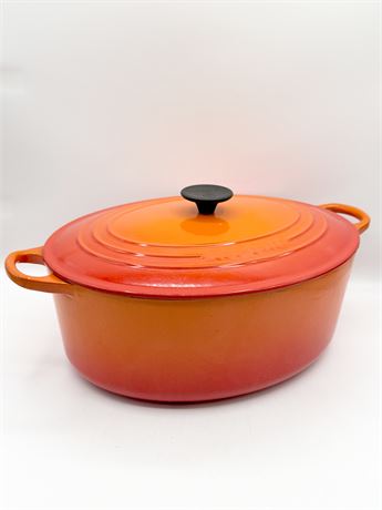 LE CREUSET ~ Enameled Cast Iron Oval Dutch Oven In Flame