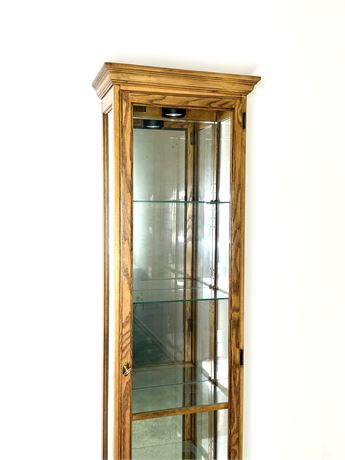 Howard Miller Tall Thin Lighted Curio Cabinet